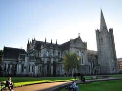 The façade of St Patrick's Cathedral under a clear blue sky