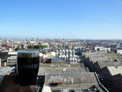 The view of Dublin from the Gravity Bar in the Guinness Storehouse under a blue sky
